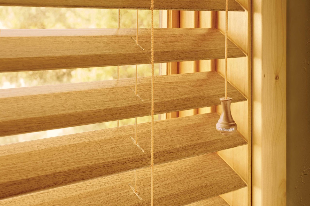 Hunter Douglas Everwood® Faux Wood Blinds in a laundry room near Richardson, TX